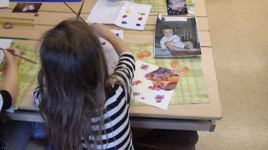 concentrating on the painting