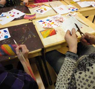 two parts of the same obect painted by child and parent together